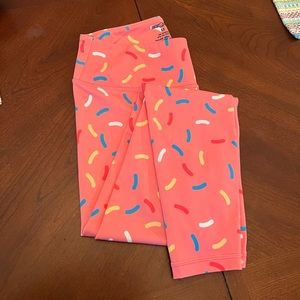 Feed Me Fight Me Donut Sprinkle leggings (M)
